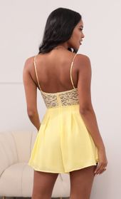 Picture thumb Kelsey Cutout Lace Romper in Yellow. Source: https://media.lucyinthesky.com/data/May21_1/170xAUTO/1V9A3737.JPG