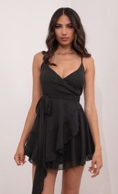 Picture thumb Ava Wrap Dress in Black Shimmer. Source: https://media.lucyinthesky.com/data/May21_1/170xAUTO/1V9A54891.JPG