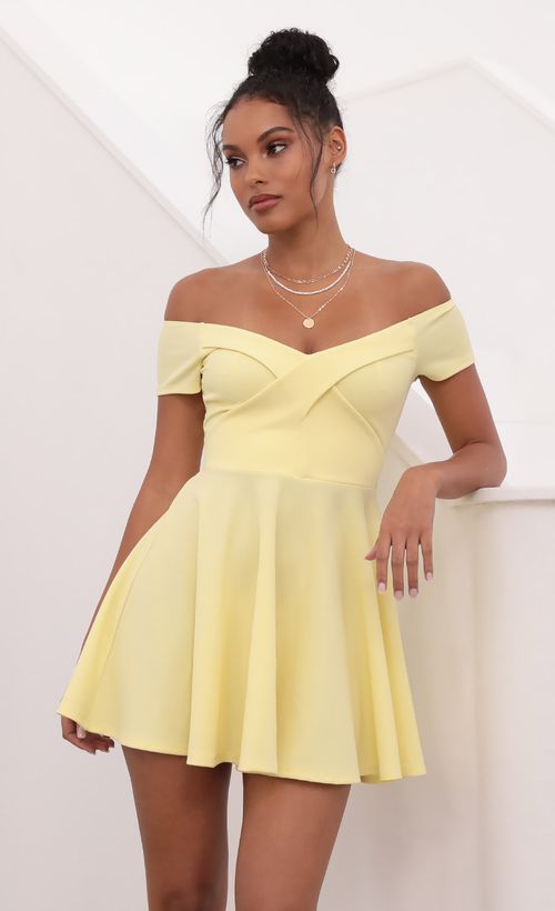 Picture Ambrose Pleated A-line Dress in Yellow. Source: https://media.lucyinthesky.com/data/May21_1/500xAUTO/1V9A1297S.JPG