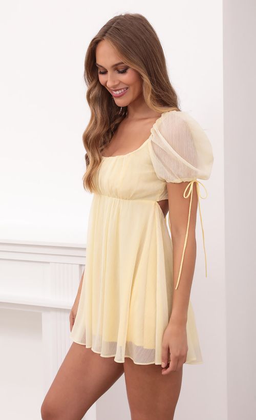 Picture Leilani Crinkle Chiffon Baby Doll Dress in Pastel Yellow. Source: https://media.lucyinthesky.com/data/May21_1/500xAUTO/1V9A1715.JPG