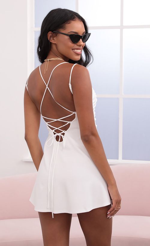 Picture Este Ruched A-Line Dress in White. Source: https://media.lucyinthesky.com/data/May21_1/500xAUTO/1V9A2928.JPG