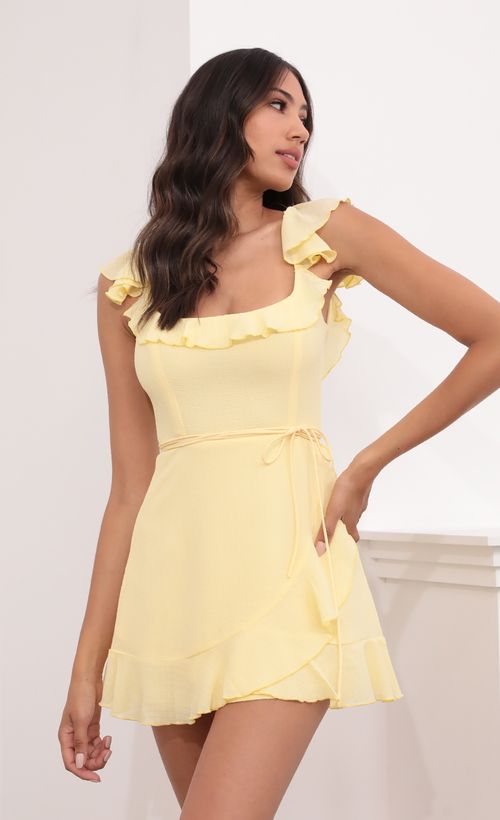 Picture Lini Wrap Pebble Crepe Dress in Yellow. Source: https://media.lucyinthesky.com/data/May21_1/500xAUTO/1V9A3708.JPG