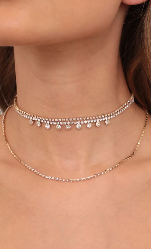 Picture Crystal Embellished Choker Set in Gold. Source: https://media.lucyinthesky.com/data/May21_1/500xAUTO/AT2A6431.JPG