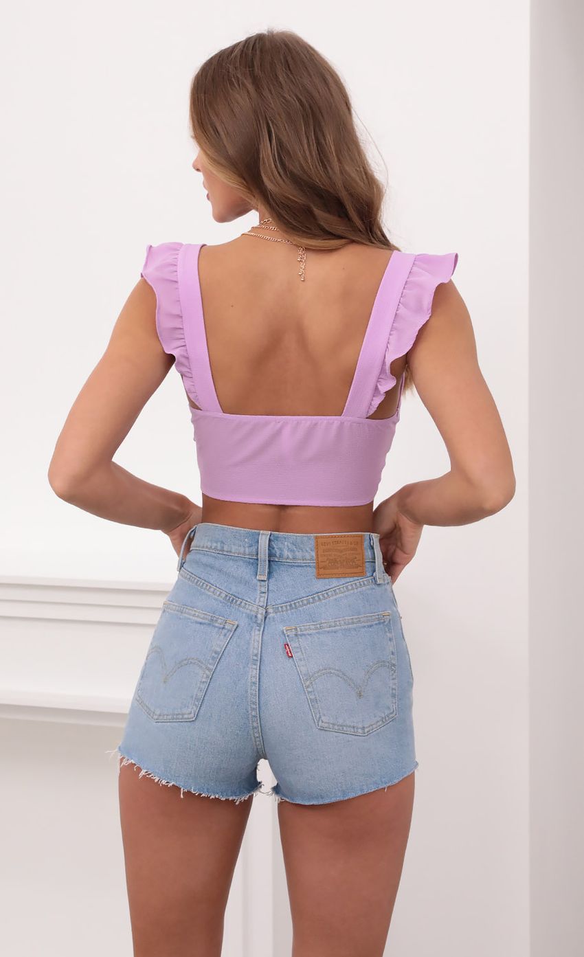 Picture Carolina Ruffle Tie Crop Top in Lavender. Source: https://media.lucyinthesky.com/data/May21_1/850xAUTO/1V9A0525.JPG