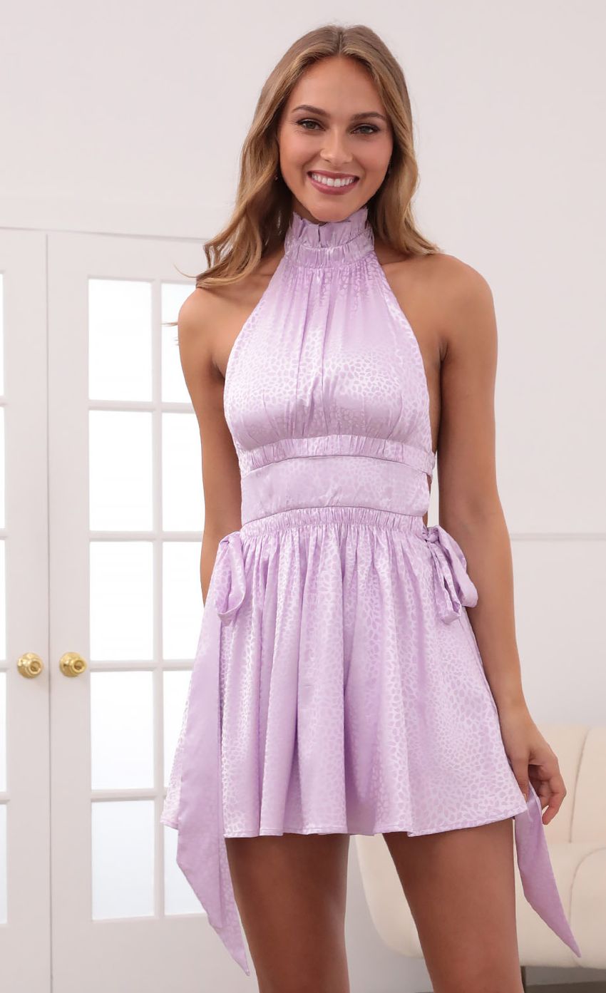 Picture Berenice Halter Dress in Lavender Jacquard Leopard Print. Source: https://media.lucyinthesky.com/data/May21_1/850xAUTO/1V9A1939.JPG