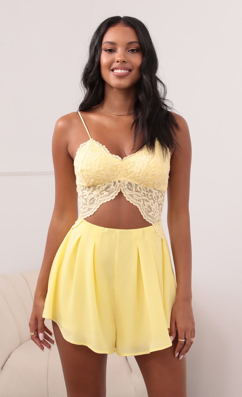 Picture Kelsey Cutout Lace Romper in Yellow. Source: https://media.lucyinthesky.com/data/May21_1/850xAUTO/1V9A37921.JPG