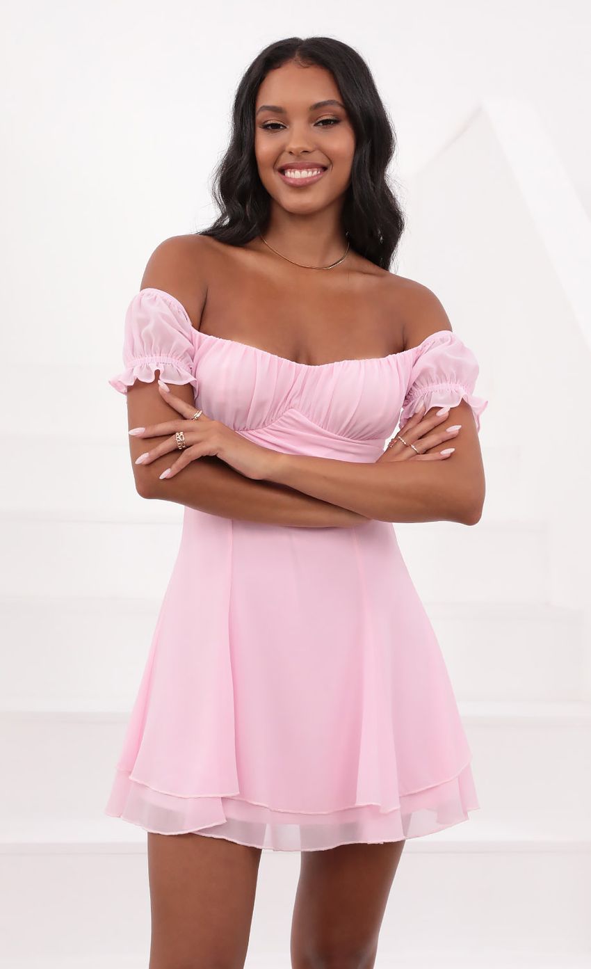 Picture Estrella Dress in Chiffon Pink. Source: https://media.lucyinthesky.com/data/May21_1/850xAUTO/1V9A4051.JPG