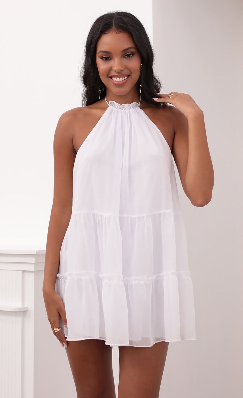 Picture Brianna Halter Dress in White Shimmer. Source: https://media.lucyinthesky.com/data/May21_1/850xAUTO/1V9A5155.JPG