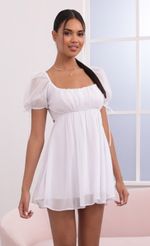 Picture Leilani Chiffon Shimmer Baby Doll Dress in White. Source: https://media.lucyinthesky.com/data/May21_2/150xAUTO/1V9A3878.JPG