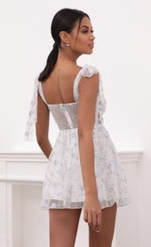 Picture thumb Jacqueline Embroidered Blue Flower Mesh Dress in White. Source: https://media.lucyinthesky.com/data/May21_2/170xAUTO/1V9A3203.JPG