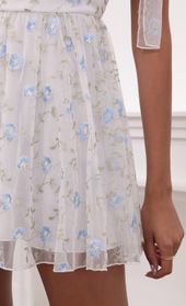 Picture thumb Jacqueline Embroidered Blue Flower Mesh Dress in White. Source: https://media.lucyinthesky.com/data/May21_2/170xAUTO/1V9A3246.JPG