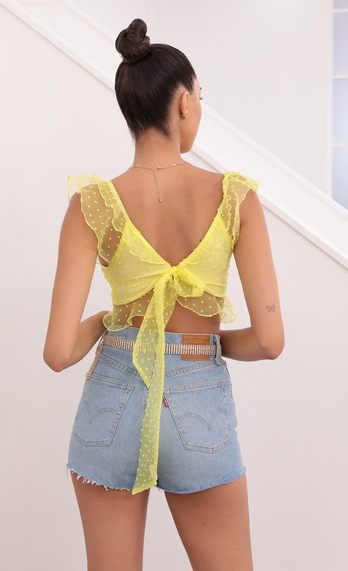 Picture Caris Dotted Chiffon Top in Yellow. Source: https://media.lucyinthesky.com/data/May21_2/500xAUTO/1V9A0959.JPG