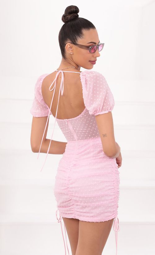 Picture Donna Ruched Cutout and Ties Dress in Pink Dotted Chiffon. Source: https://media.lucyinthesky.com/data/May21_2/500xAUTO/1V9A1230.JPG
