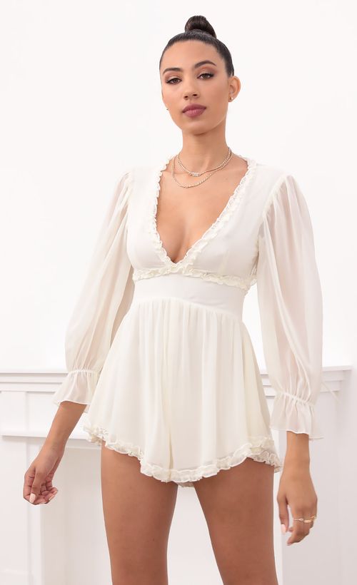 Picture Bettina Ruched Ruffle Romper in Ivory. Source: https://media.lucyinthesky.com/data/May21_2/500xAUTO/1V9A1433.JPG