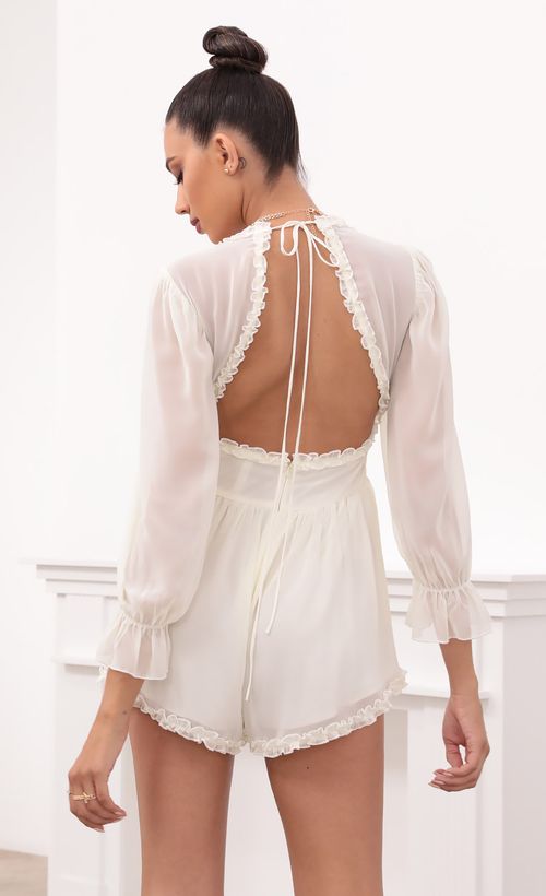 Picture Bettina Ruched Ruffle Romper in Ivory. Source: https://media.lucyinthesky.com/data/May21_2/500xAUTO/1V9A1504.JPG