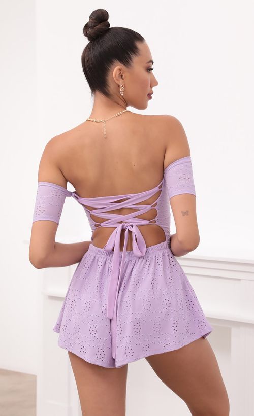 Picture Gabriella Lavender Eyelet Lace-Up Romper. Source: https://media.lucyinthesky.com/data/May21_2/500xAUTO/1V9A2711.JPG