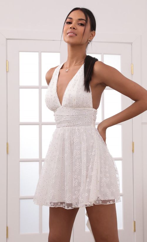 Picture Marguerite Plunge A-Line Dress in White Daisies. Source: https://media.lucyinthesky.com/data/May21_2/500xAUTO/1V9A3021.JPG