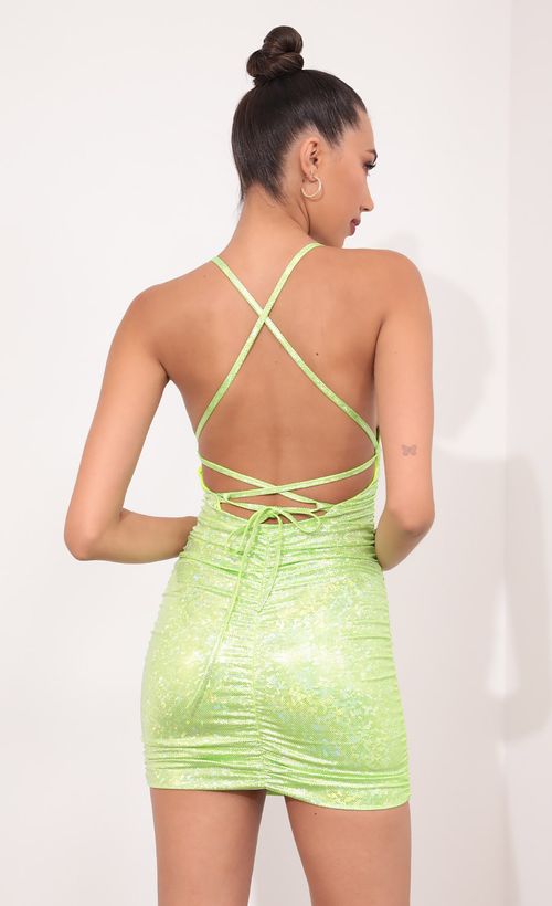 Picture Rhythm Cross Back Bodycon Dress in Metallic Lime Green. Source: https://media.lucyinthesky.com/data/May21_2/500xAUTO/1V9A3572.JPG