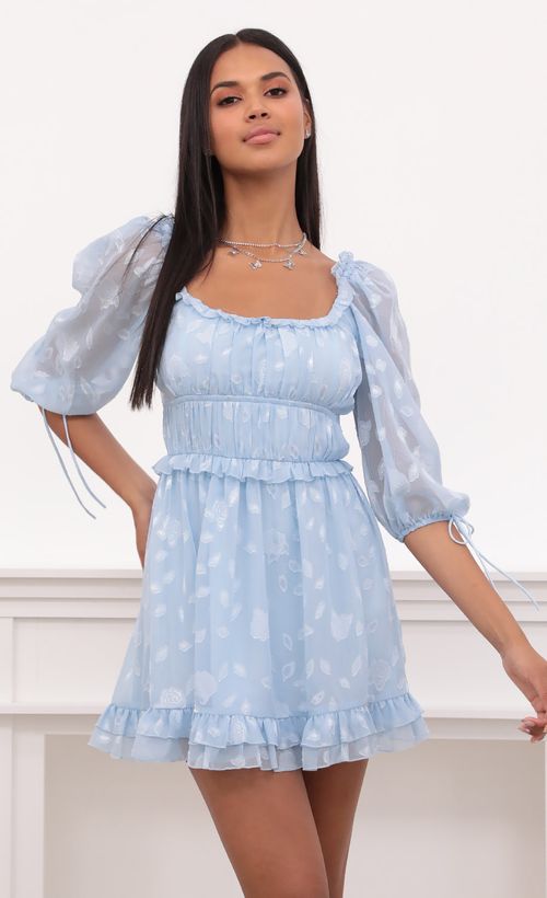 Picture April Puff Sleeve Dress in Light Blue Floral Chiffon. Source: https://media.lucyinthesky.com/data/May21_2/500xAUTO/1V9A4979.JPG