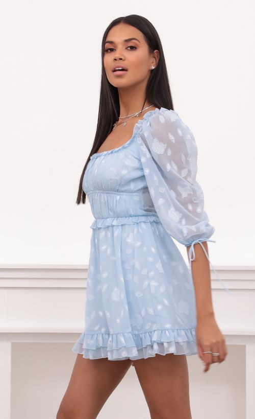 Picture April Puff Sleeve Dress in Light Blue Floral Chiffon. Source: https://media.lucyinthesky.com/data/May21_2/500xAUTO/1V9A5008.JPG