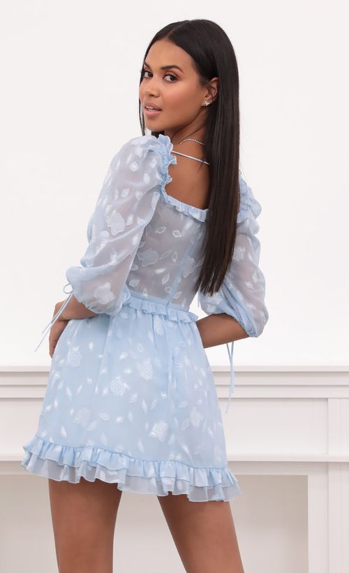 Picture April Puff Sleeve Dress in Light Blue Floral Chiffon. Source: https://media.lucyinthesky.com/data/May21_2/500xAUTO/1V9A5031.JPG