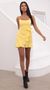 Picture Capri Ruffle Tie Dress in Light Yellow. Source: https://media.lucyinthesky.com/data/May21_2/50x90/1V9A1706.JPG