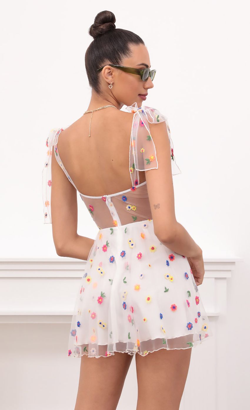 Picture Jacqueline Embroidered Flower Mesh in White. Source: https://media.lucyinthesky.com/data/May21_2/850xAUTO/1V9A1978.JPG