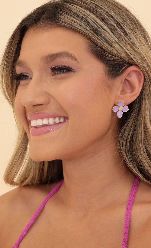 Picture Time to Bloom Earring in Purple. Source: https://media.lucyinthesky.com/data/May22_1/500xAUTO/1V9A0900.JPG