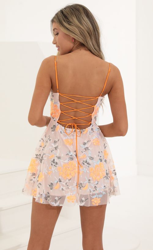 Picture Gladys Sequin Fit and Flare Dress in Orange and Pink. Source: https://media.lucyinthesky.com/data/May22_1/500xAUTO/1V9A7814.JPG