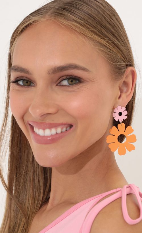 Picture In The Mood To Groove Earring in Orange. Source: https://media.lucyinthesky.com/data/May22_1/500xAUTO/2V9A1614.JPG