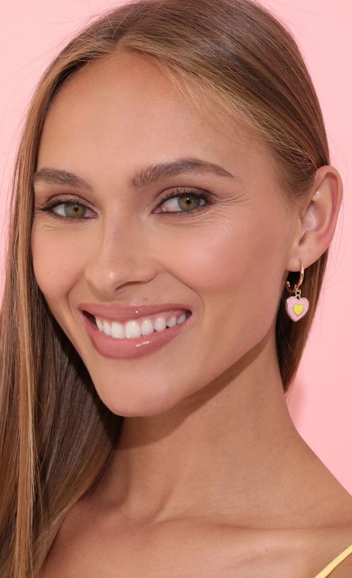 Picture Power Of Love Earring in Pink. Source: https://media.lucyinthesky.com/data/May22_1/500xAUTO/2V9A3526.JPG