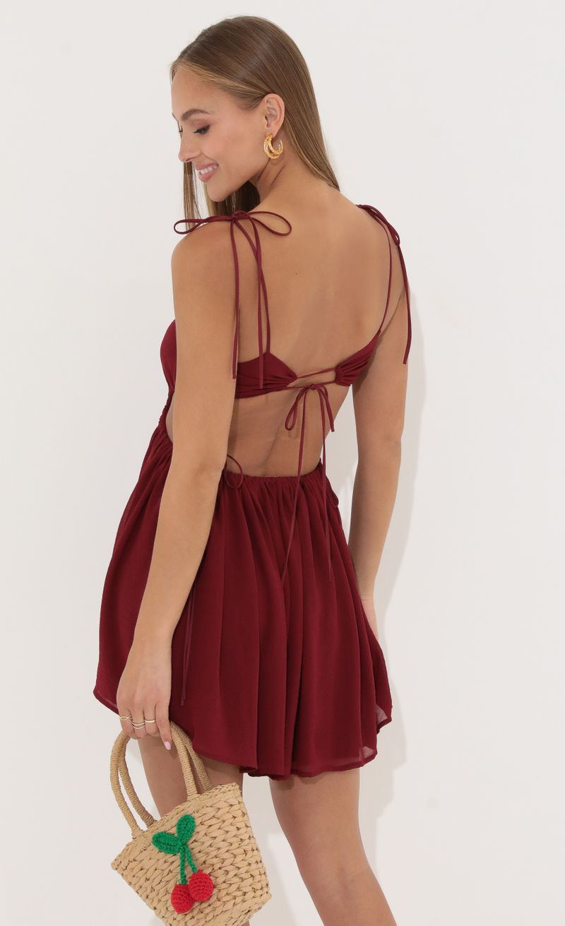 Picture Louise Open Back Dress in Red. Source: https://media.lucyinthesky.com/data/May22_1/800xAUTO/1V9A5901.JPG