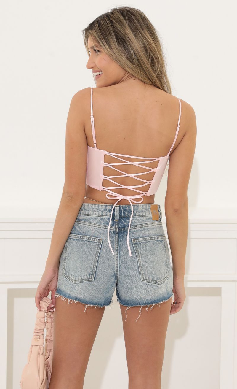Picture Frida Corset Top in Pink. Source: https://media.lucyinthesky.com/data/May22_1/800xAUTO/1V9A8646.JPG