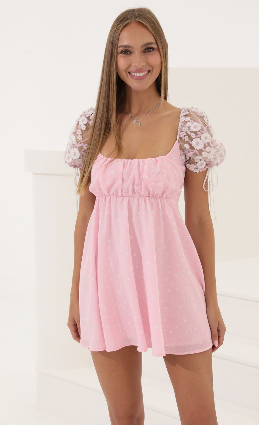 Picture Leilani Bubble Crepe Baby Doll Dress in Pink. Source: https://media.lucyinthesky.com/data/May22_1/850xAUTO/1V9A0907.JPG