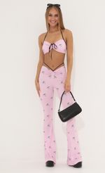 Picture Melli Two Piece Set in Pink Eye Print. Source: https://media.lucyinthesky.com/data/May22_2/150xAUTO/1V9A5307.JPG