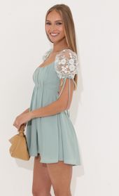 Picture thumb Leilani Crepe Baby Doll Dress in Teal. Source: https://media.lucyinthesky.com/data/May22_2/170xAUTO/1V9A2617.JPG