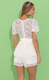 Picture thumb Christy Lace Ruffle Romper in White. Source: https://media.lucyinthesky.com/data/May22_2/170xAUTO/1V9A9447.JPG