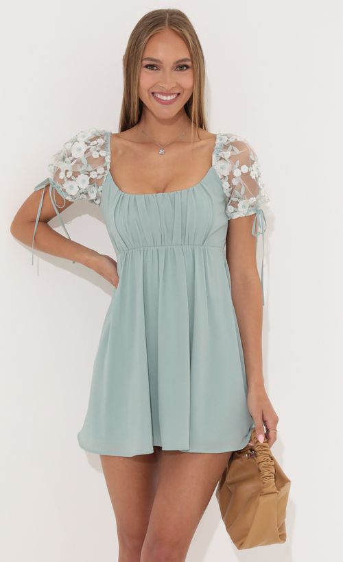 Picture Leilani Crepe Baby Doll Dress in Teal. Source: https://media.lucyinthesky.com/data/May22_2/500xAUTO/1V9A2575.JPG