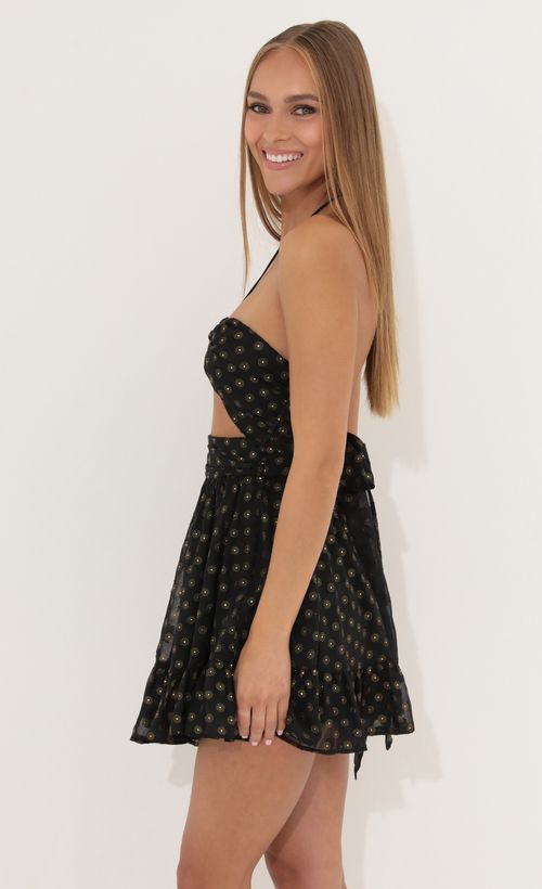 Picture Arli Baby Doll Dress in Black with Gold Dots. Source: https://media.lucyinthesky.com/data/May22_2/500xAUTO/1V9A2719.JPG