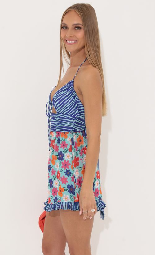 Picture Cali Floral Cutout Romper in Blue. Source: https://media.lucyinthesky.com/data/May22_2/500xAUTO/1V9A6275.JPG