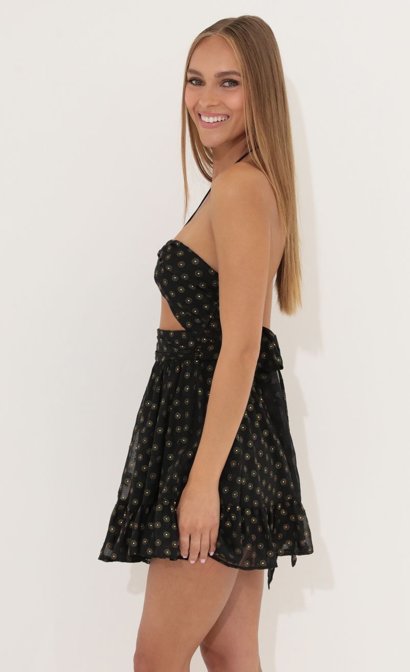 Picture Arli Baby Doll Dress in Black with Gold Dots. Source: https://media.lucyinthesky.com/data/May22_2/800xAUTO/1V9A2719.JPG