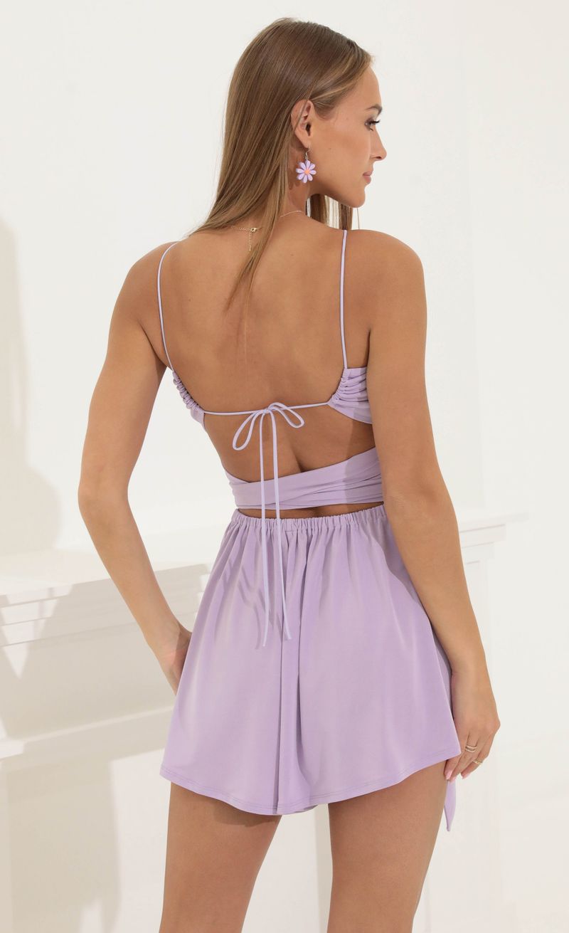 Picture Sammie Wrap Romper in Purple. Source: https://media.lucyinthesky.com/data/May22_2/800xAUTO/1V9A3000.JPG