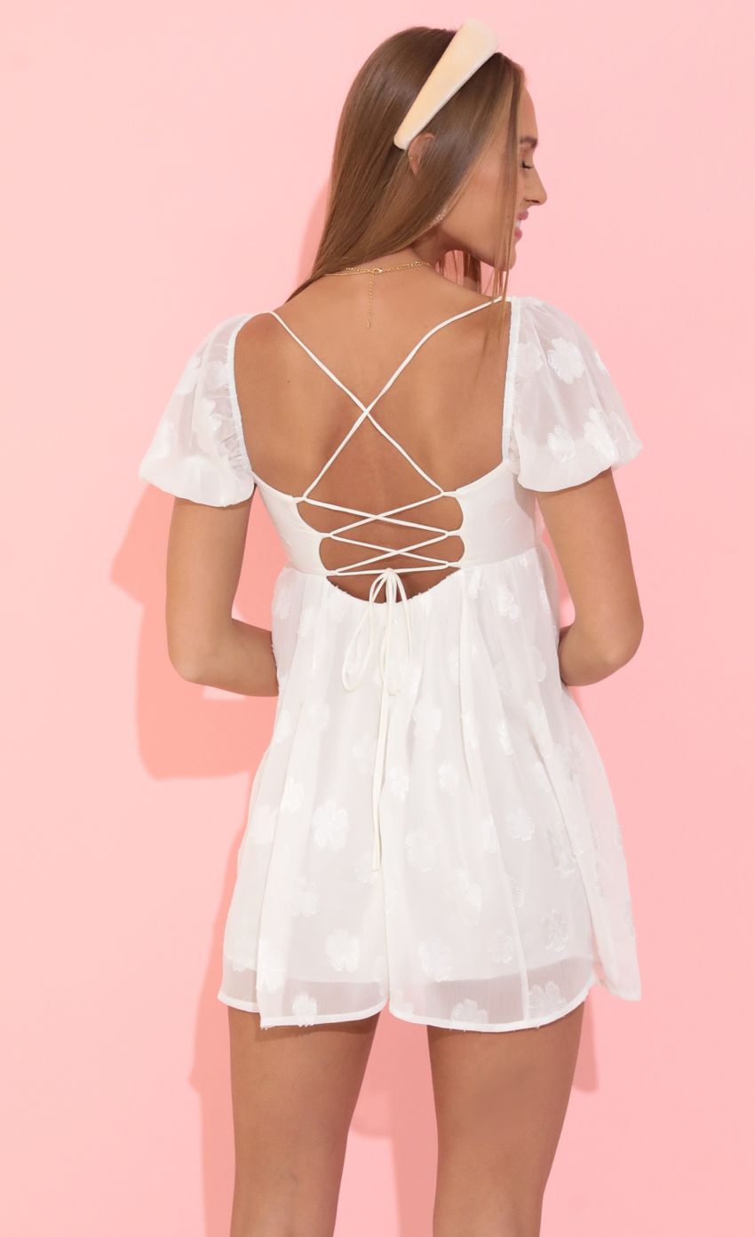 Picture Suzy Chiffon Puff Sleeve Dress in White. Source: https://media.lucyinthesky.com/data/May22_2/850xAUTO/1V9A1462.JPG