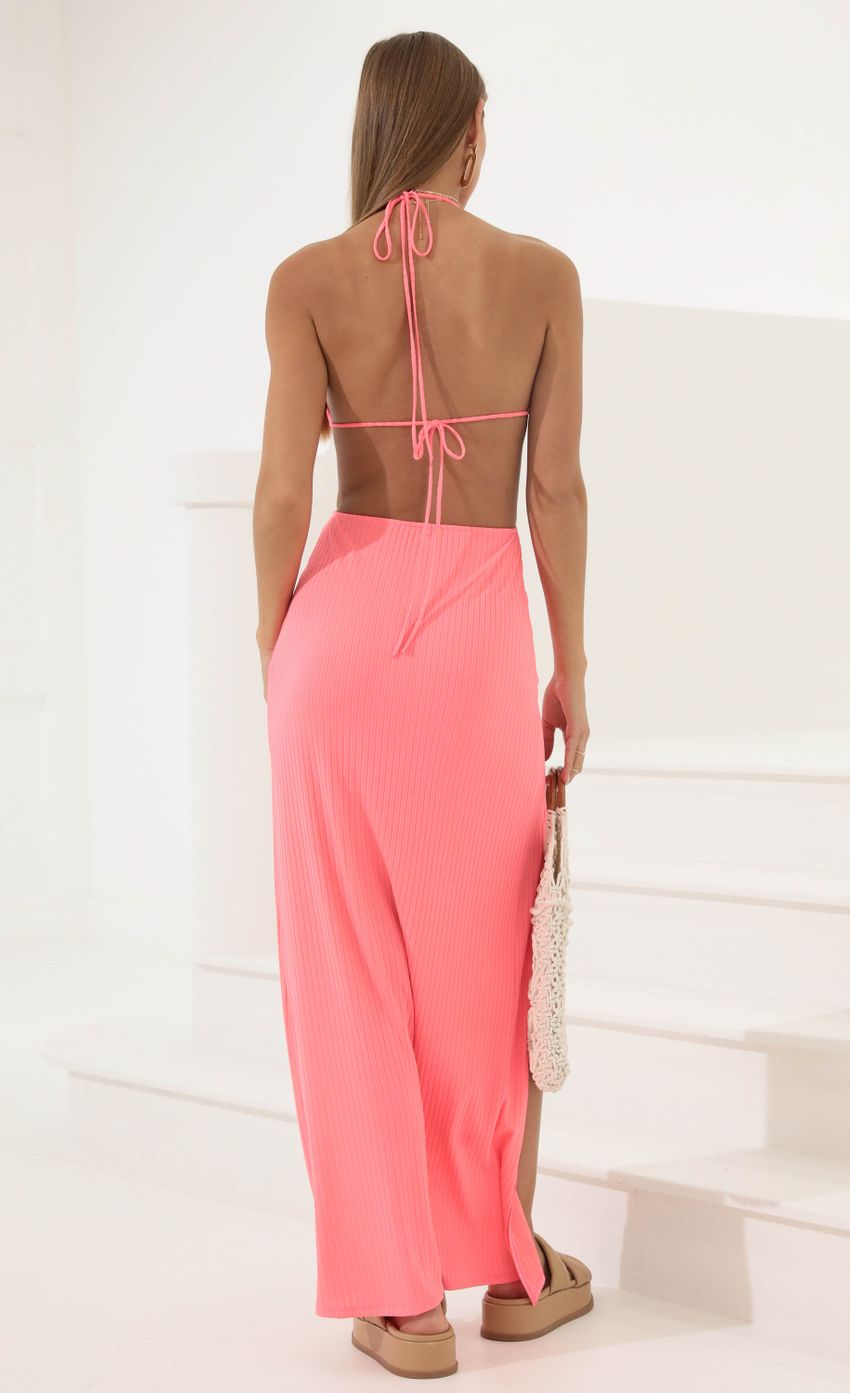 Picture Tana Bikini Cutout Maxi Dress in Neon Pink. Source: https://media.lucyinthesky.com/data/May22_2/850xAUTO/1V9A3045.JPG