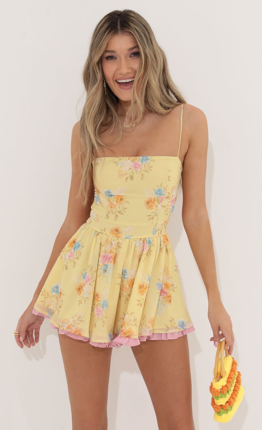 Picture Jeselle Square Neck Floral Romper in Yellow. Source: https://media.lucyinthesky.com/data/May22_2/850xAUTO/1V9A3385.JPG