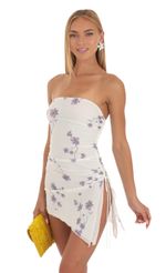 Picture Katrina Strapless Dress in White and Purple Floral Print. Source: https://media.lucyinthesky.com/data/May23/150xAUTO/0beb0efd-67e0-498e-888d-e649577f4e84.jpg