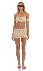 Picture Trona Crochet Off Shoulder Two Piece Skirt Set in Beige. Source: https://media.lucyinthesky.com/data/May23/150xAUTO/3f2aeeca-209e-445f-9651-ba725591bb6b.jpg