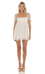 Picture Emerson Baby Doll Dress in White Daisy. Source: https://media.lucyinthesky.com/data/May23/150xAUTO/4ba81209-0477-439e-a419-b8068aa4255b.jpg