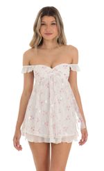 Picture Saanvi Off Shoulder Babydoll Dress in White Floral Lace. Source: https://media.lucyinthesky.com/data/May23/150xAUTO/4fa3863c-183e-4156-b713-342f56de8421.jpg