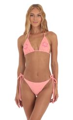 Picture Mykonos Reversible Triangle Bikini Set in Pink Avocado. Source: https://media.lucyinthesky.com/data/May23/150xAUTO/aca3ba83-d528-470f-9222-998834e623a0.jpg